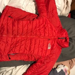 Red north face winter jacket